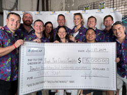 photo of Jencap employees donating a big check